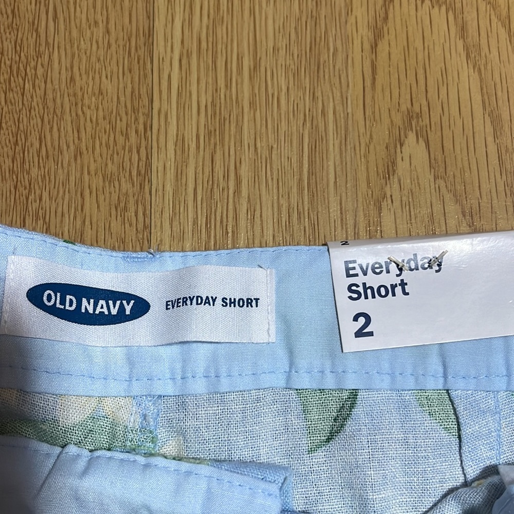 BRAND NEW WITH TAGS OLD NAVY LIGHT BLUE WITH DIFFERENT COLOR FLOWERS SHORTS! - Picture 3 of 4